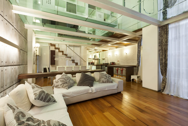 Sleek glass railing with stainless steel fittings in Hamilton<br />
 property